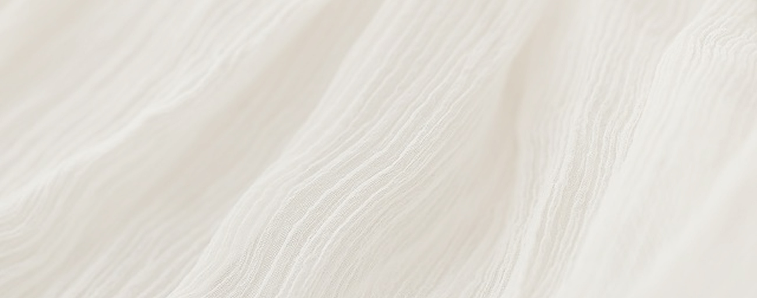 Close-up of textured white fabric.