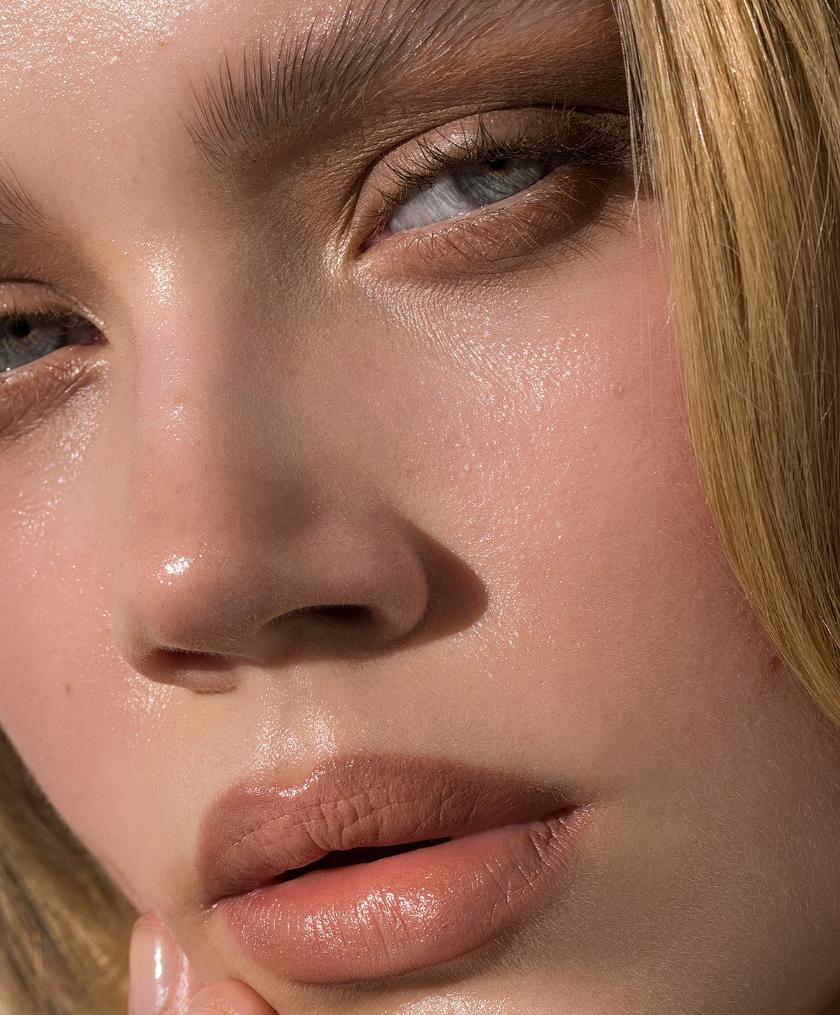Close-up of woman's face with natural makeup.