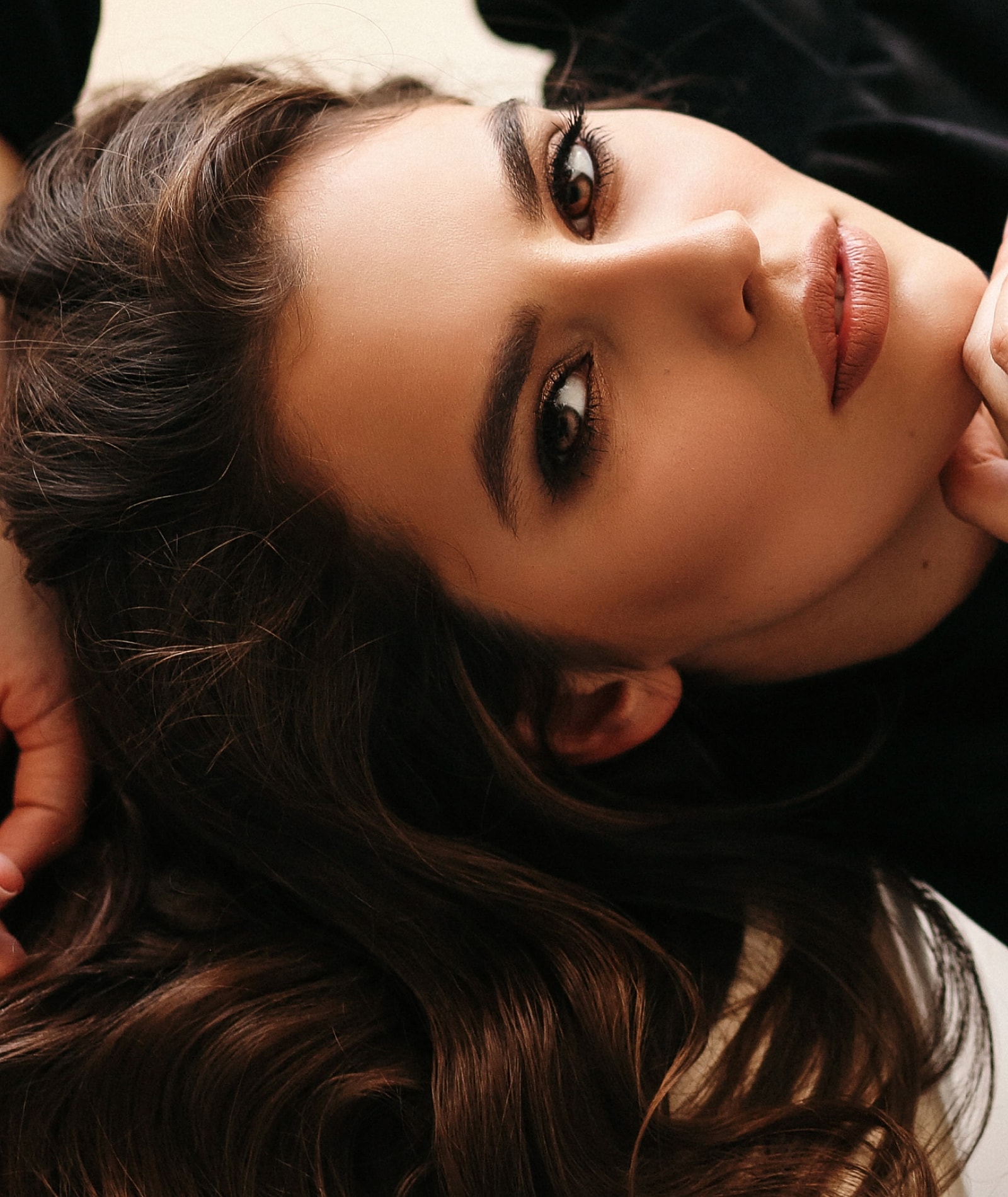 Close-up portrait of a woman with long hair.