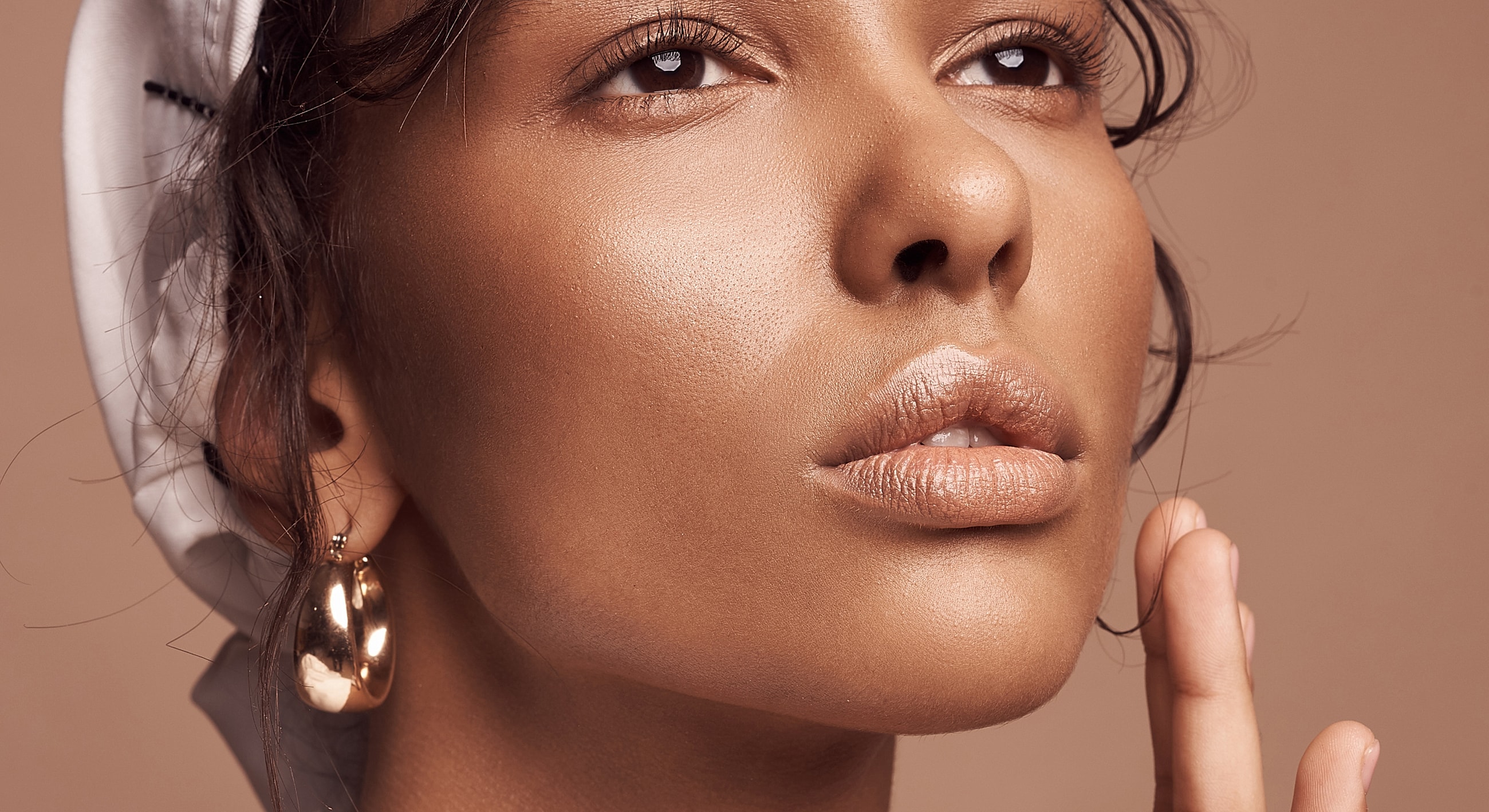 Close-up of a woman with elegant makeup.