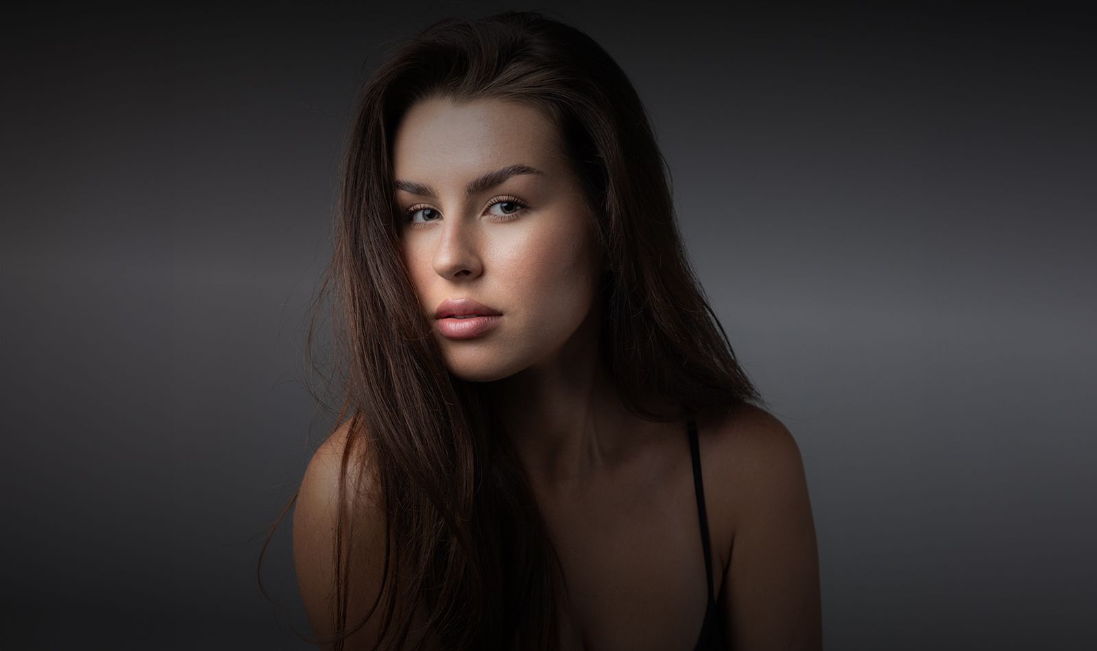 Portrait of a woman with stylish hairstyle.